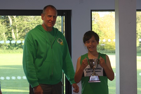 2015 winner Simon Holt receiving his trophy from Club Chairman Nigel.